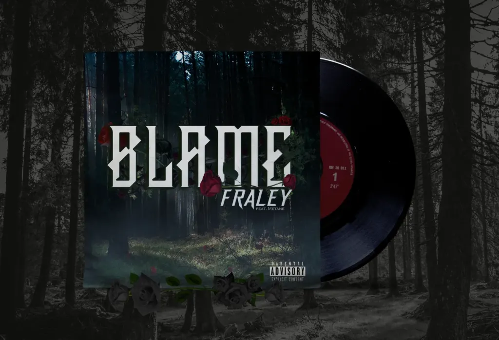 Blame single cover art for Fraley shown on a vinyl record sleeve in a dark pine forest